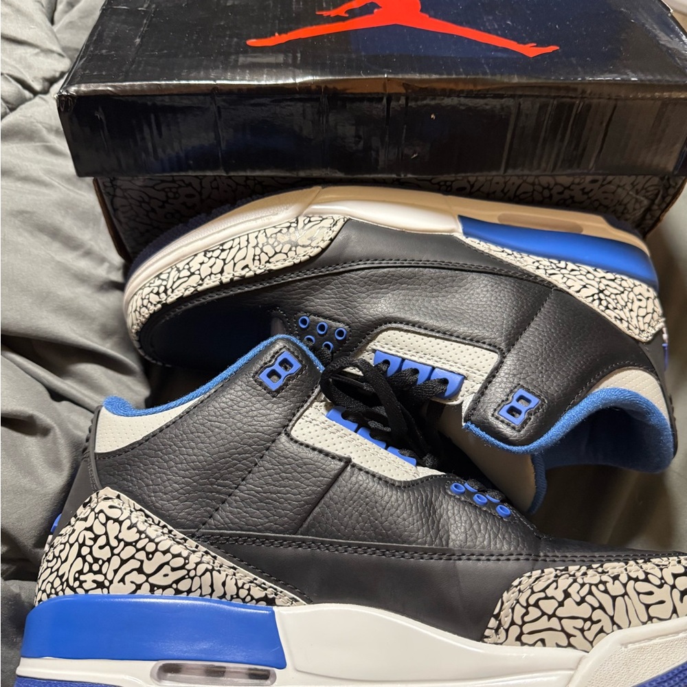 Jordan Black and Blue High-Top Sneakers with Classic Silhouette. Retro 3